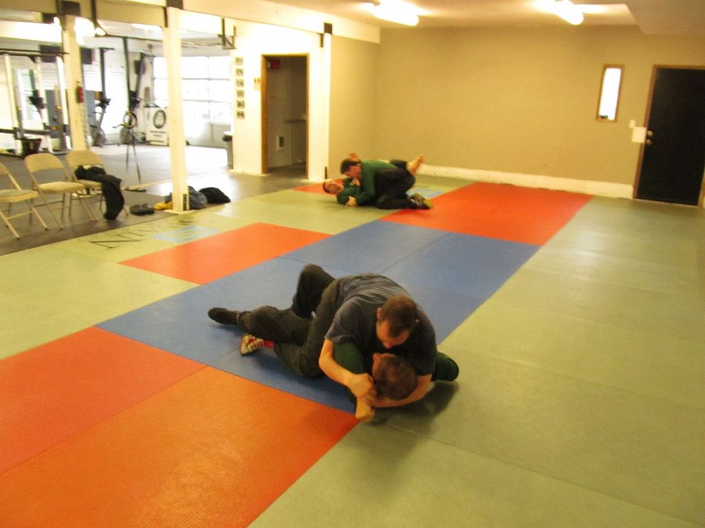 Technique practice during grappling class.