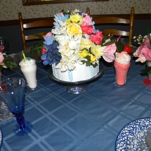 Faux Blue Cake Floral Arrangement
$90.00