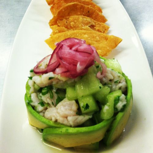 white fish ceviche, honeydew salsa, pickled red on