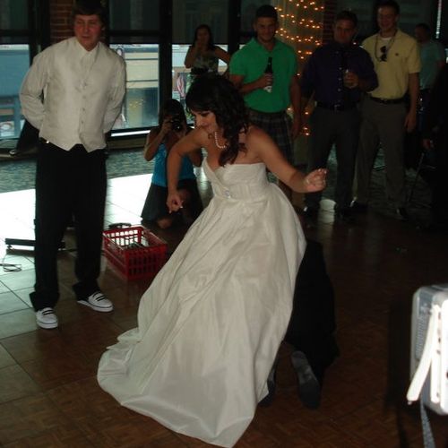 Cuttin' that rug!  What a lively bride.  Great tim