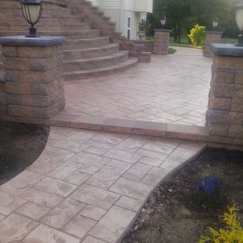 stamp concrete with raised patio with ephenry wall