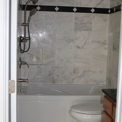 Jacuzzi Tub and Surrounding Marble Tile
