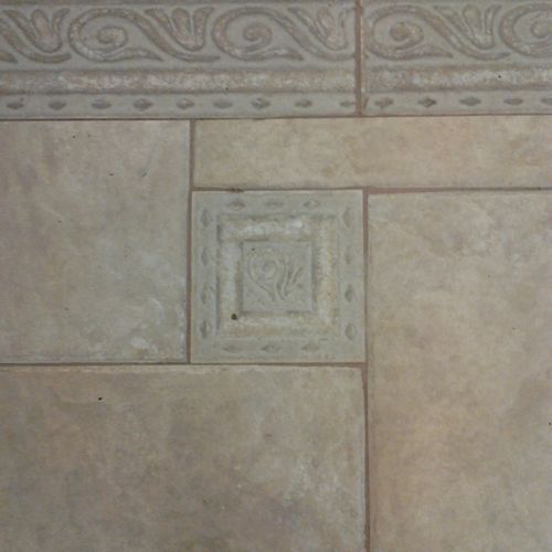 See how dirty the grout lines are.