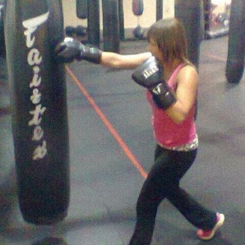 Paulette getting work in on the heavy bag.