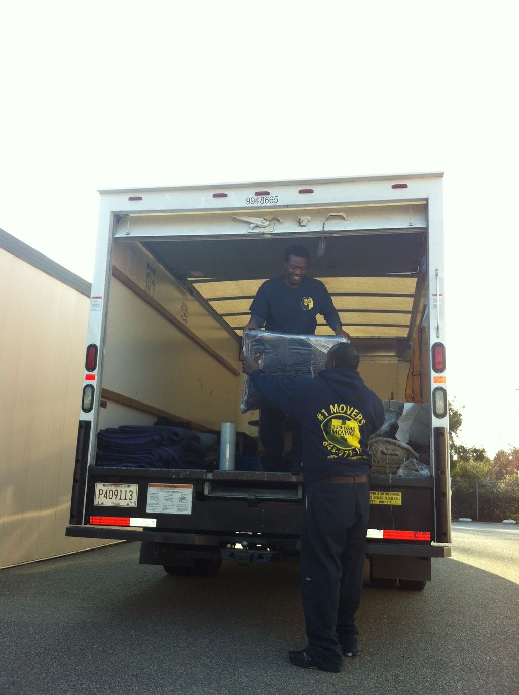 Crew unloading at storage