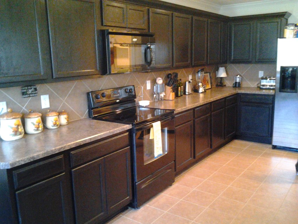 Re-stained cabinets with new crown molding additio