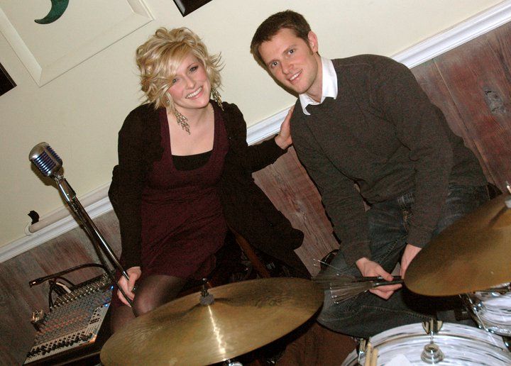 My wife Emily and I playing music together at a re