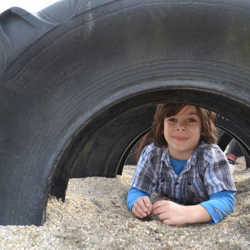 Here my son is going through a row of tires.