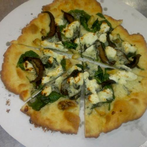 gluten free white pizza with portabellos and spina