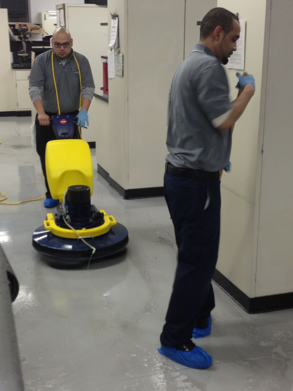 CSI Clean Team refinishing a vinyl floor