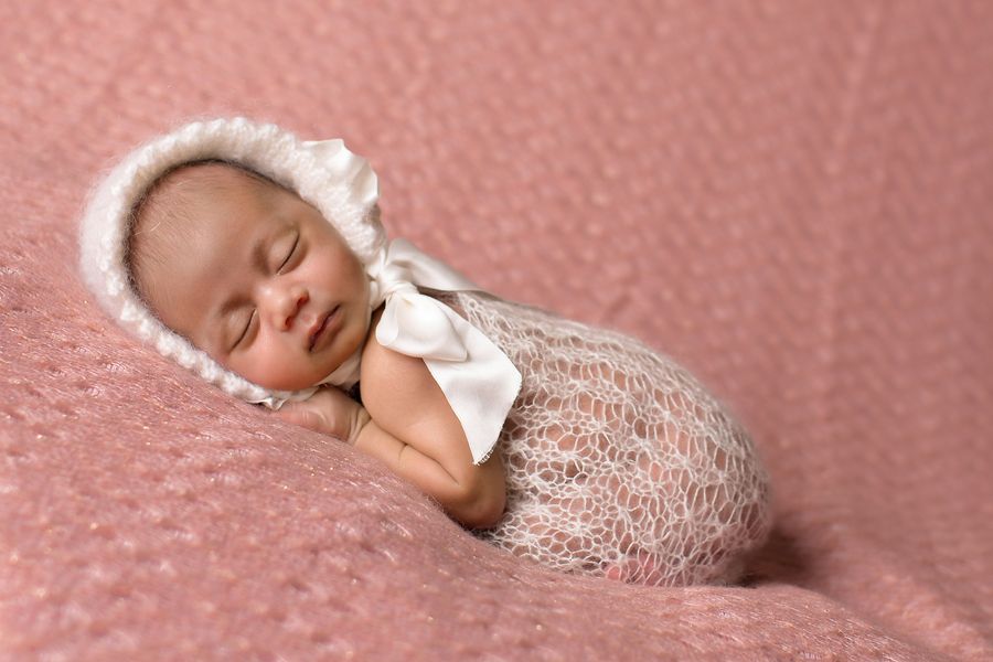 Newborn baby girl, 9 days old.