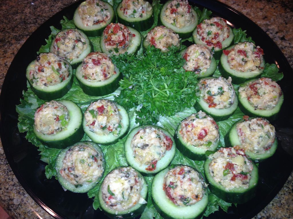 Cucumber Cups with couscous, artichoke hearts, sun