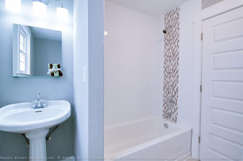 Totally redone bathroom! Painting, tiling, floorin