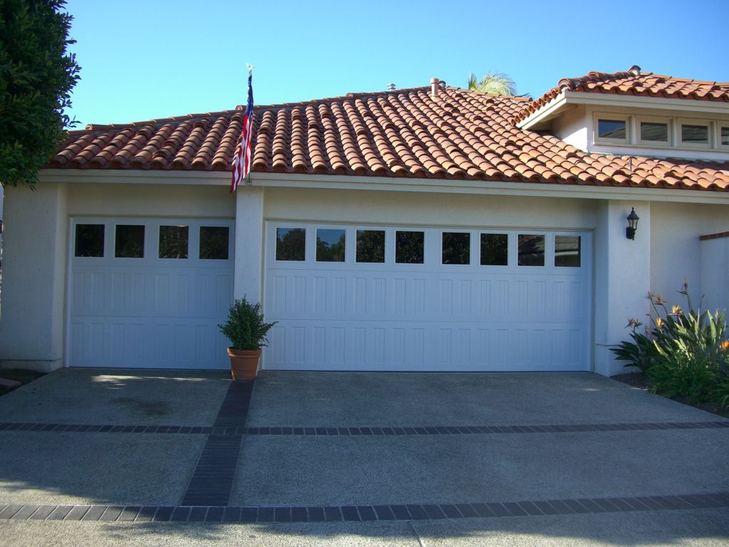 Before
www.FauxMyGarageDoor.com