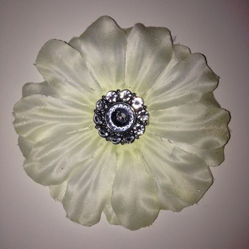 Large Formal White flower. Center with silver and 