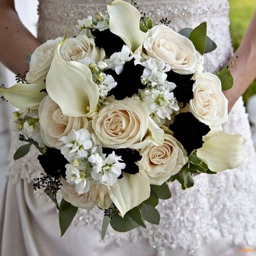 The classic white bridal bouquet with a touch of c