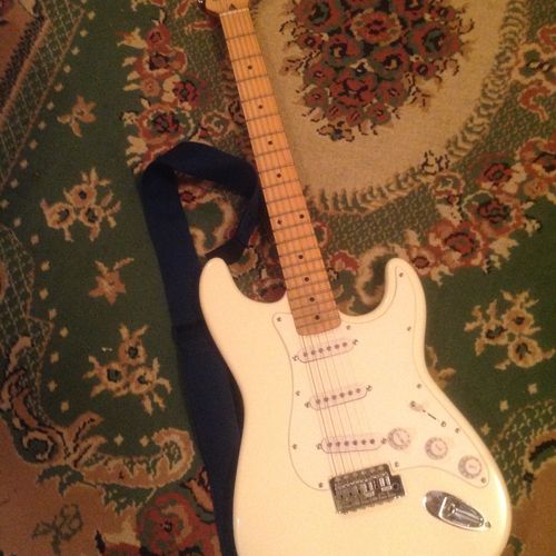 A Fender strat goes with anything. I love guitars 