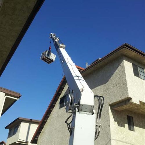 installation of package unit on townhouse.