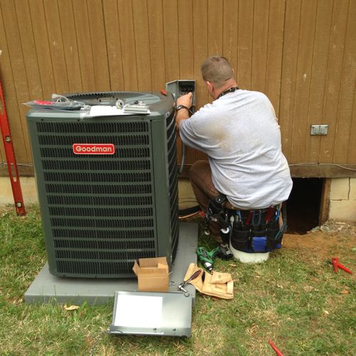 Me installing a 16 SEER Goodman Heat Pump