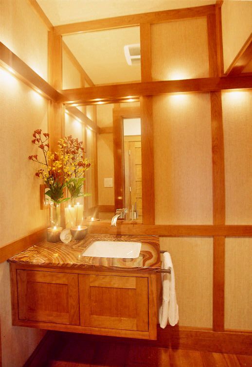 Diminutive Japanese powder room tucked under the s