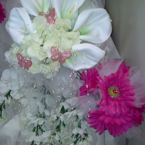 This  wedding cascade bouquet is made from silk fl