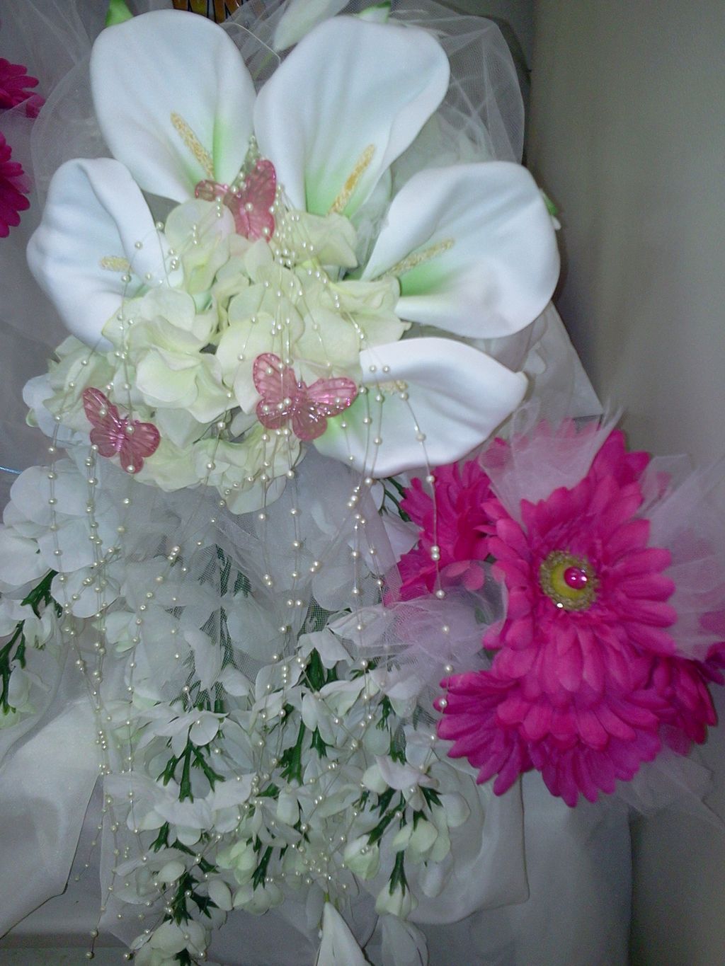 This  wedding cascade bouquet is made from silk fl