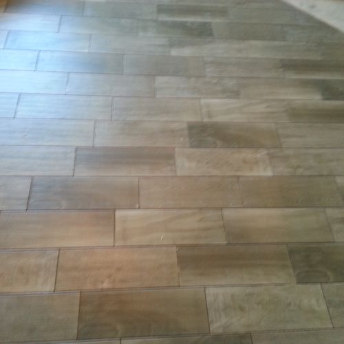Wood looking tile, tight grout joint.