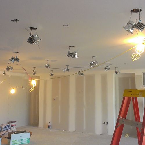 Installation of LED light fixtures.  Omni building