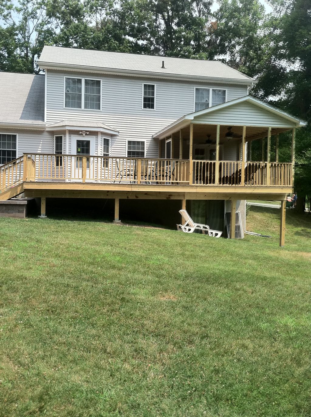 Rear deck, enclosed porch and uni-lock patio 2012