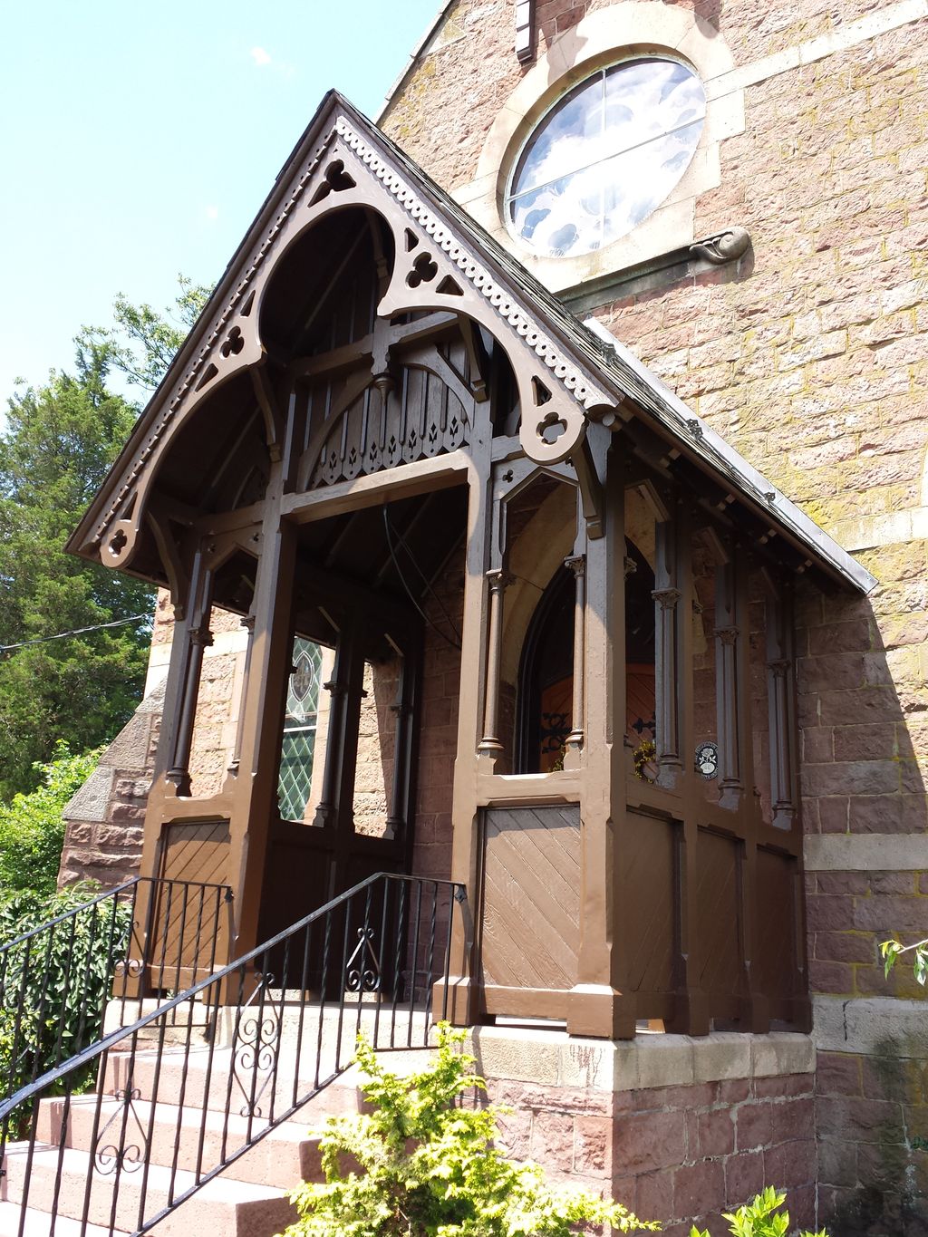 replaced rotten wood and scroll work and repainted