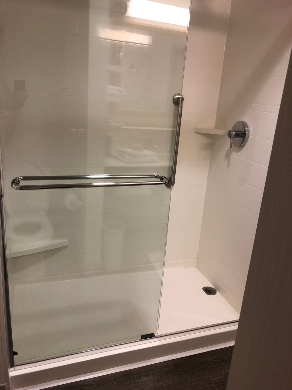 Tub change out to a molded shower base with tile w