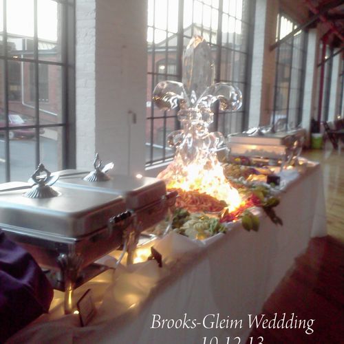 Ice Sculpture with Vegetable Display and Buffet