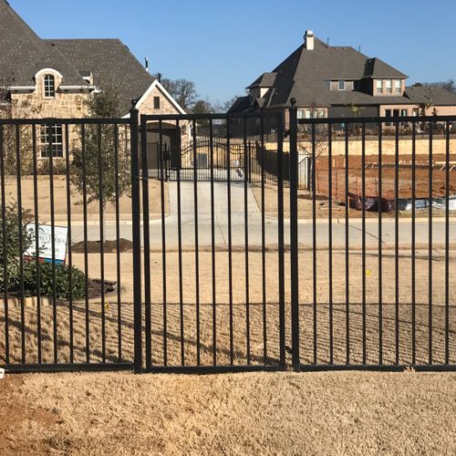 Built and installed gate in wrought iron fence