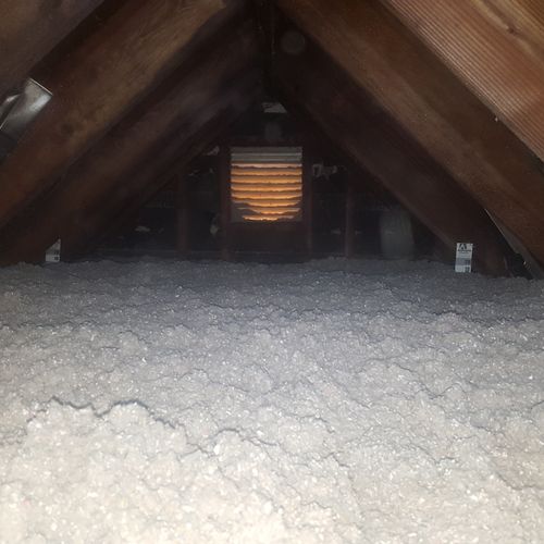 We blow in new attic insulation