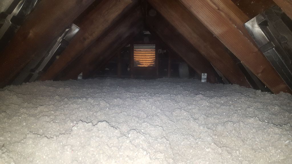 We blow in new attic insulation