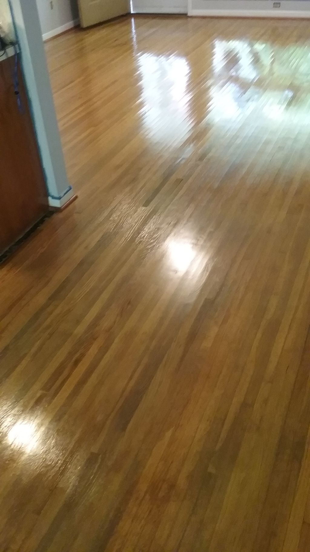 The wear spots are gone, and the floor looks warm,