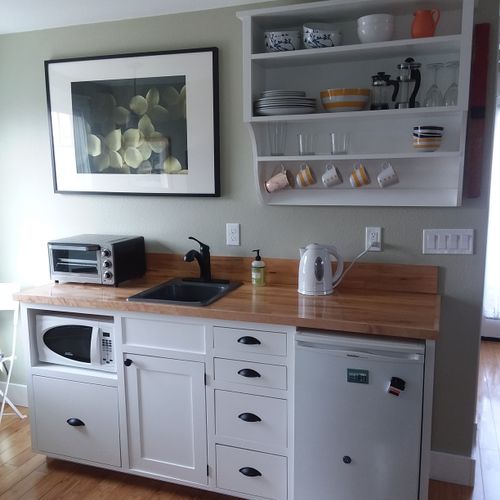 sweet tiny kitchen in a studio vacation rental. 