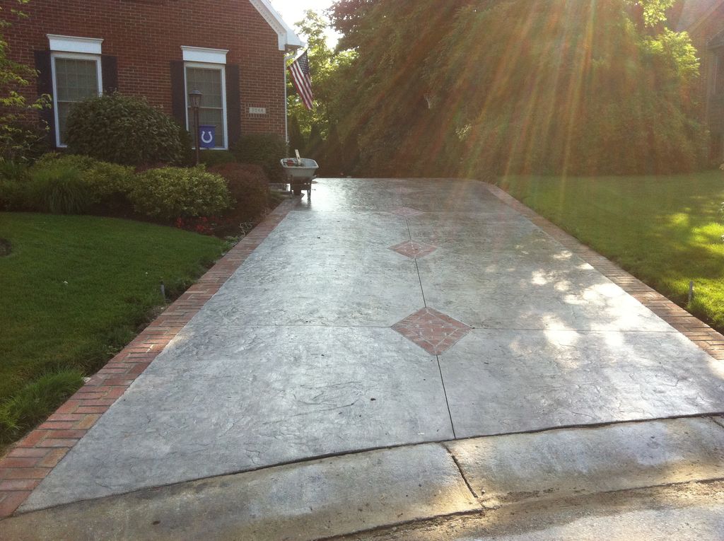 stamped driveway with real brick border