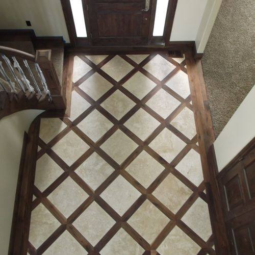 Walnut flooring with travertine inlay