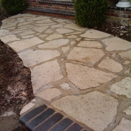 Flagstone pathways, brick patios and landscaping
