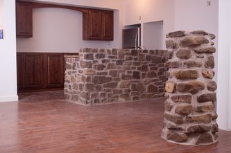 Interior stone and rock creates a custom home
