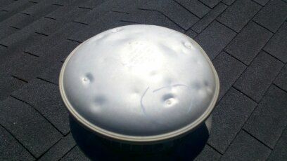 Hail Damage to Heat Stack (note several dents)