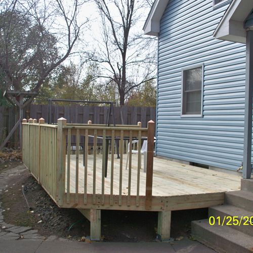 We removed an existing deck and expanded a new dec