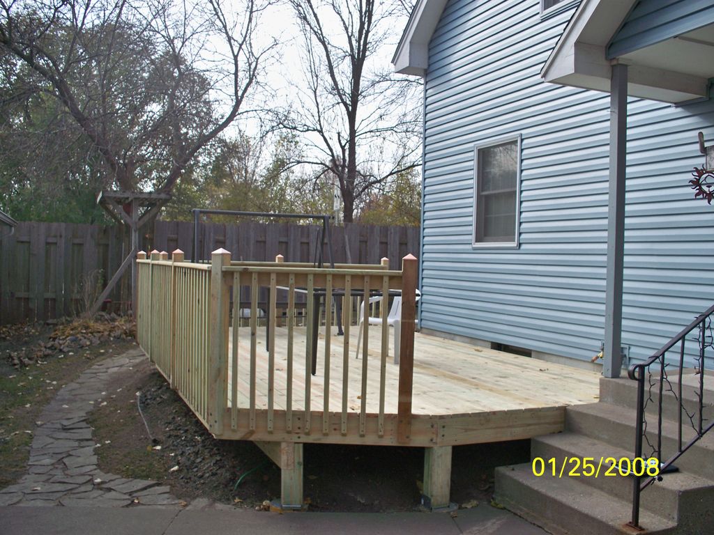 We removed an existing deck and expanded a new dec