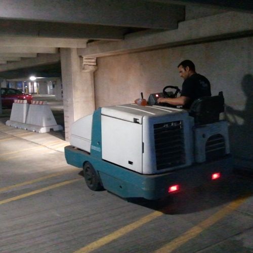 Power floor sweeping and scrubbing of multi-level 