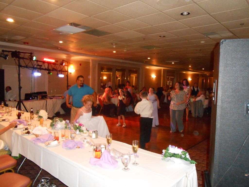 People starting to come up to dance at wedding rec