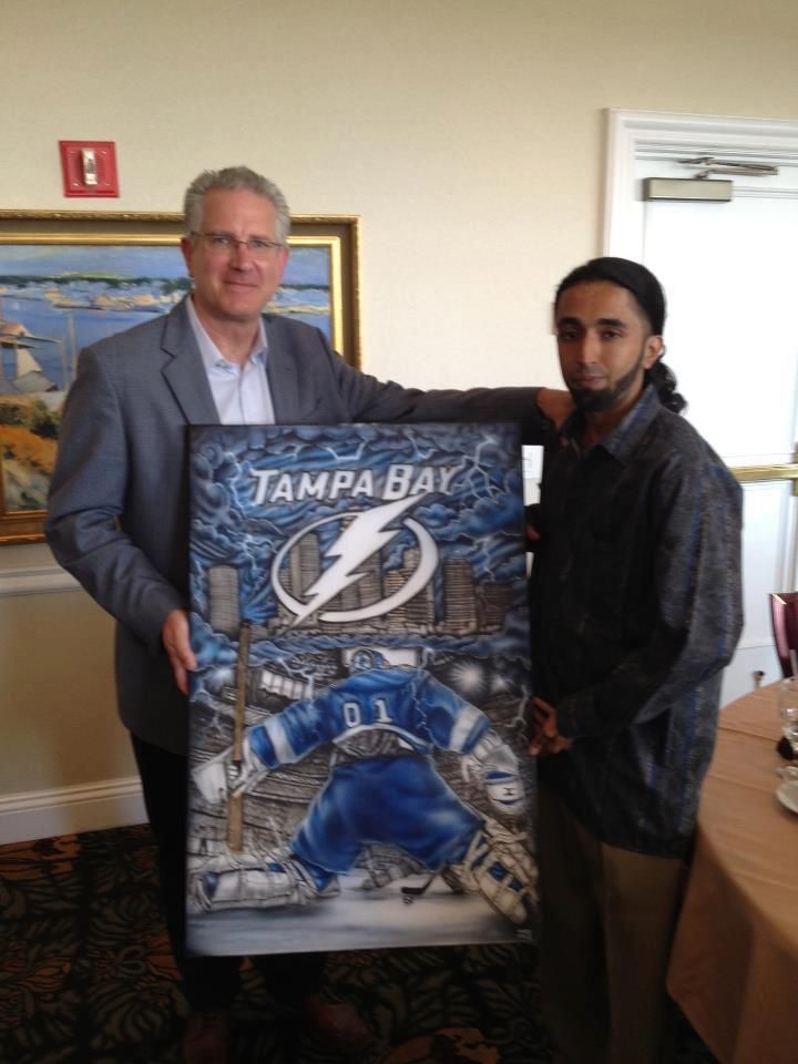 Presenting the creation to Tod Lieweke, CEO of Tam