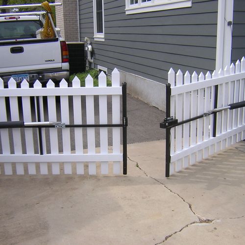 PVC picket gate with operator