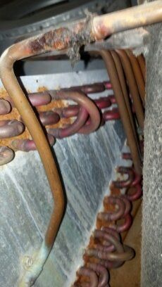 This is a picture of a rusting a frame coil in an 