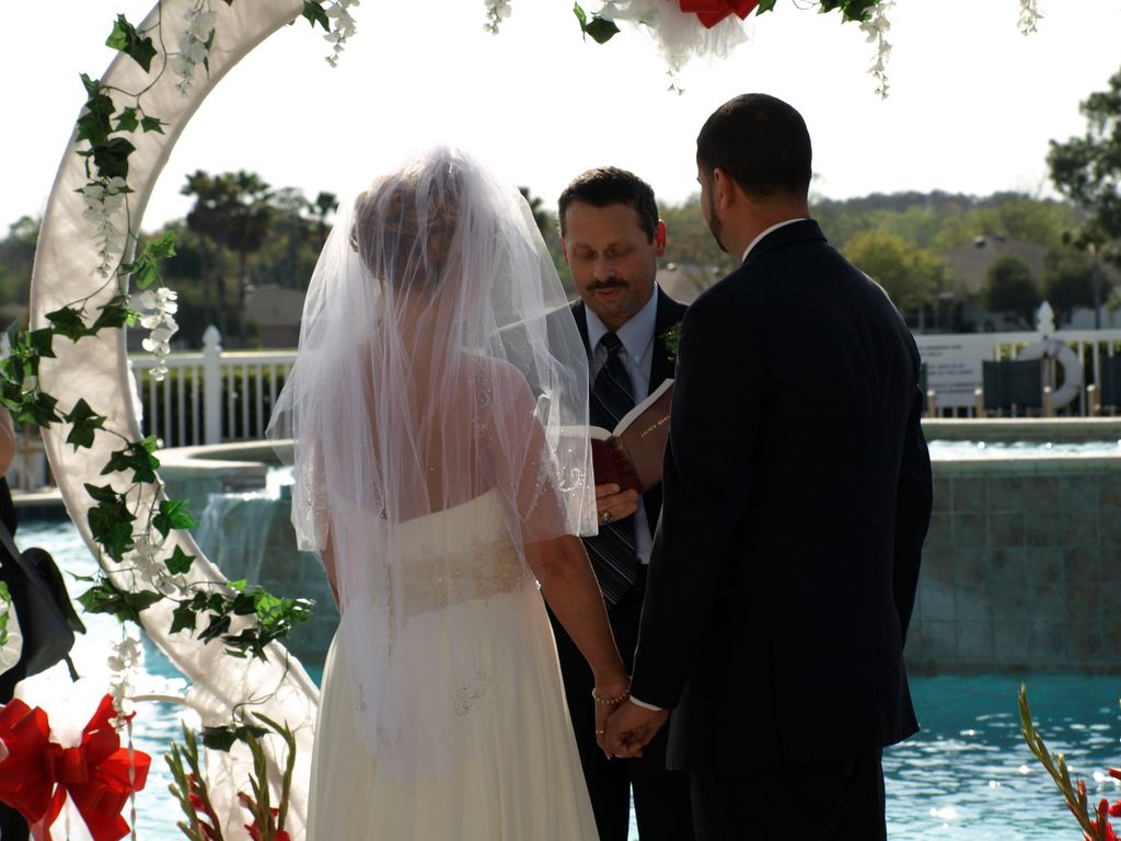 Rev. Tom officiating over a ceremony.